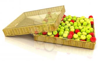 Wicker basket full of apples isolated on white