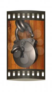 Old padlock on a wooden door