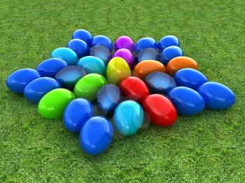 Colored Easter eggs as a flower on a green grass