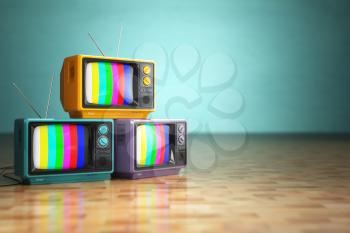 Vintage television concept. Stack of retro tv set on green background. 3d