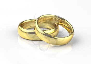 Gold wedding rings with reflection on white background.