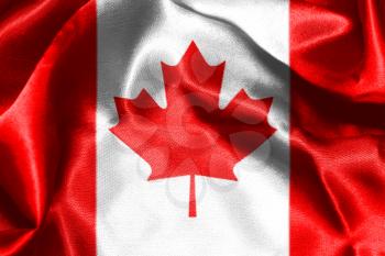 Canadian National Flag With Maple Leaf On It in Red And White Colors