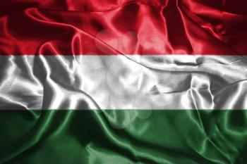 Hungarian National Flag Waving in the Wind Grunge Looking 3D illustration