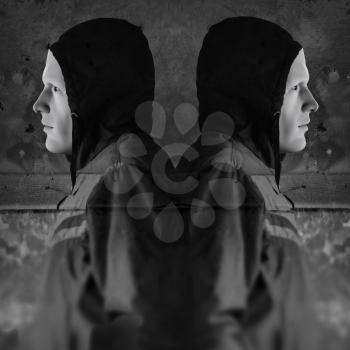 Twin figures against grungy wall background. 3d illustration and photo composite.