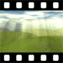 Filtered sunlight on hilly landscape