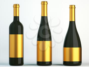 Three black bottles for wine with golden labels on white