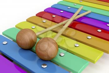 Colorful wooden xylophone with mallets, close-up image