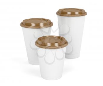 Three paper coffee cups with brown lids on white background