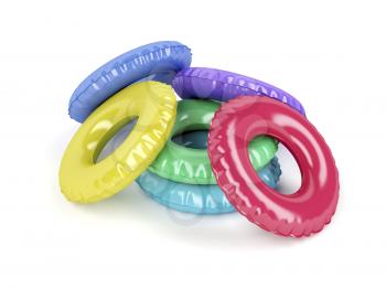 Swim rings with different colors on white background 