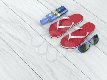 Flip-flops, sunscreen lotion and sunglasses on wood floor 