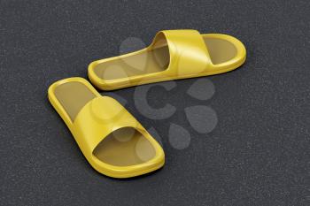 Yellow rubber slides on the asphalt