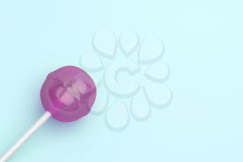 Lollipop on turquoise background, top view 