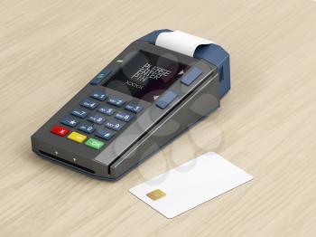 Credit card terminal and blank card on wooden desk