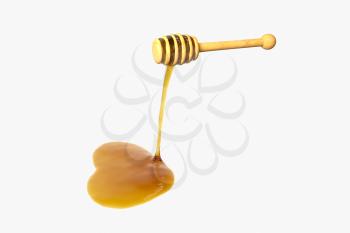 Golden honey drop from honey dipper, 3d rendering. Computer digital drawing.