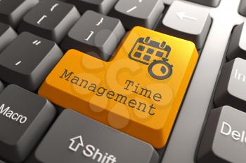 Time Management - Orange Button on Computer Keyboard. Business Concept.