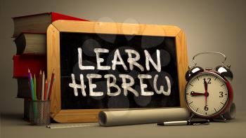Hand Drawn Learn Hebrew Concept  on Chalkboard. Blurred Background. Toned Image. 3D Render.