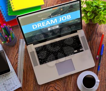 Dream Job Concept. Modern Laptop and Different Office Supply on Wooden Desktop background. 3D Render.