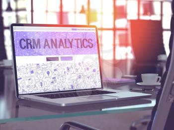  CRM Analytics - Closeup Landing Page in Doodle Design Style on Laptop Screen. On Background of Comfortable Working Place in Modern Office. Toned, Blurred Image. 3D Render.