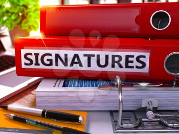 Red Ring Binder with Inscription Signatures on Background of Working Table with Office Supplies and Laptop. Signatures Business Concept on Blurred Background. 3D Render.