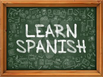 Learn Spanish - Hand Drawn on Green Chalkboard with Doodle Icons Around. Modern Illustration with Doodle Design Style.