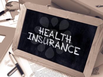 Hand Drawn Health Insurance Concept  on Chalkboard. Blurred Background. Toned Image. 3D Render.