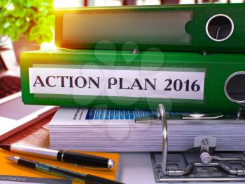 Green Ring Binder with Inscription Action Plan 2016 on Background of Working Table with Office Supplies and Laptop. Action Plan 2016 Business Concept on Blurred Background. 3D Render.
