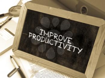Hand Drawn Improve Productivity Concept  on Chalkboard. Blurred Background. Toned Image. 3D Render.