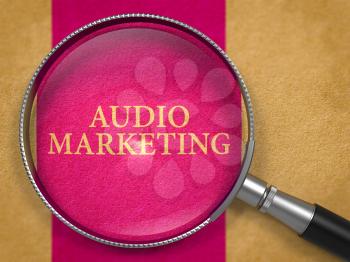 Audio Marketing through Magnifying Glass on Old Paper with Lilac Vertical Line Background. 3D Render.
