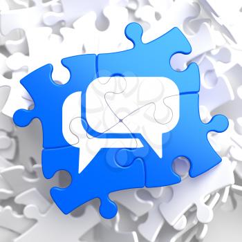 White Speech Bubble Icon on Blue Puzzle. Communication Concept.