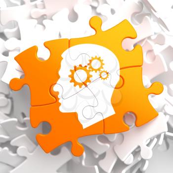 Psychological Concept - Profile of Head with Cogwheel Gear Mechanism Located on Orange Puzzle.