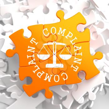 Complaint Word Written Arround Icon of Scales in Balance, Located on Orange Puzzle. Business Concept.