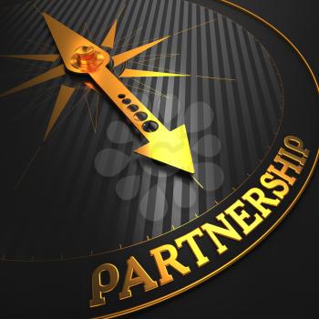 Partnership - Business Concept. Golden Compass Needle on a Black Field Pointing to the Word Partnership.