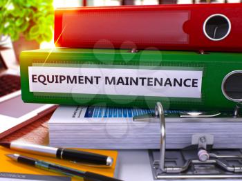 Green Ring Binder with Inscription Equipment Maintenance on Background of Working Table with Office Supplies and Laptop. Equipment Maintenance Business Concept on Blurred Background. 3D Render.