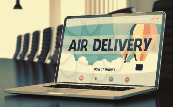 Air Delivery - Landing Page with Inscription on Laptop Display on Background of Comfortable Conference Hall in Modern Office. Closeup View. Toned Image. Selective Focus. 3D Render.