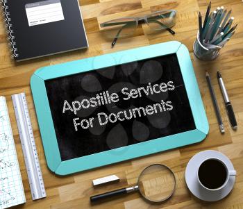 Apostille Services For Documents - Mint Small Chalkboard with Hand Drawn Text and Stationery on Office Desk. Top View. Apostille Services For Documents Handwritten on Small Chalkboard. 3d Rendering.
