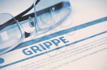 Grippe - Medicine Concept with Blurred Text and Specs on Blue Background. Selective Focus. 3D Rendering.