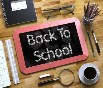 Back To School - Text on Small Chalkboard.Back To School Handwritten on Small Chalkboard. 3d Rendering.