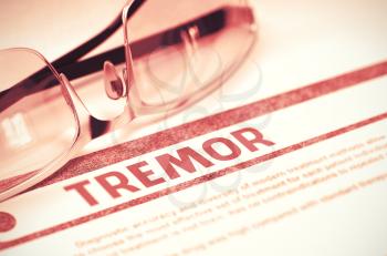 Diagnosis - Tremor. Medical Concept with Blurred Text and Pair of Spectacles on Red Background. Selective Focus. 3D Rendering.