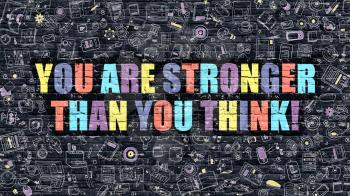 Multicolor Concept - You are Stronger than You Think on Dark Brick Wall with Doodle Icons. You are Stronger than You Think Business Concept. You are Stronger than You Think.