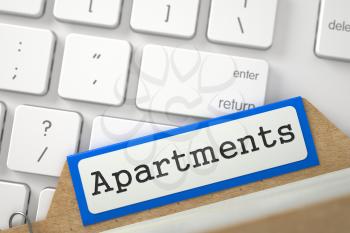 Apartments written on Blue Folder Register on Background of Computer Keyboard. Closeup View. Blurred Image. 3D Rendering.