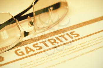 Gastritis - Medicine Concept with Blurred Text and Pair of Spectacles on Red Background. Selective Focus. 3D Rendering.