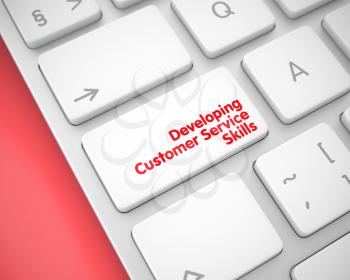 Developing Customer Service Skills Button on Metallic Keyboard. Developing Customer Service Skills Written on the White Keypad of Conceptual Keyboard. 3D.