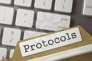 Protocols. Folder Index on Background of White PC Keyboard. Business Concept. Closeup View. Selective Focus. Toned Image. 3D Rendering.