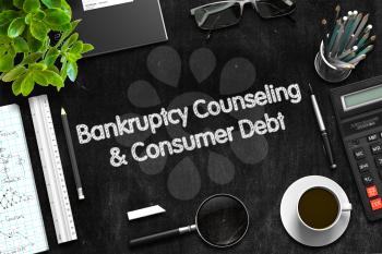 Bankruptcy Counseling and Consumer Debt - Black Chalkboard with Hand Drawn Text and Stationery. Top View. 3d Rendering. 