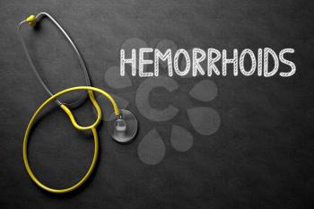 Medical Concept: Hemorrhoids Handwritten on Black Chalkboard. Medical Concept: Hemorrhoids on Black Chalkboard. 3D Rendering.