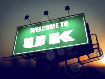 Welcome to United Kingdom - Green Billboard on the Rising Sun Background.