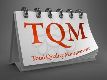 TQM -  Total Quality Management - Red Text on White Desktop Calendar.