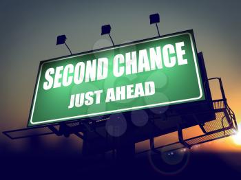 Second Chance Just Ahead - Green Billboard on the Rising Sun Background.