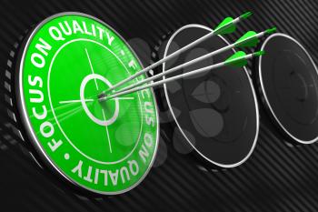 Focus on Quality Slogan. Three Arrows Hitting the Center of Green Target on Black Background.