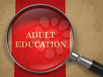 Adult Education concept. Magnifying Glass on Old Paper with Red Vertical Line Background.